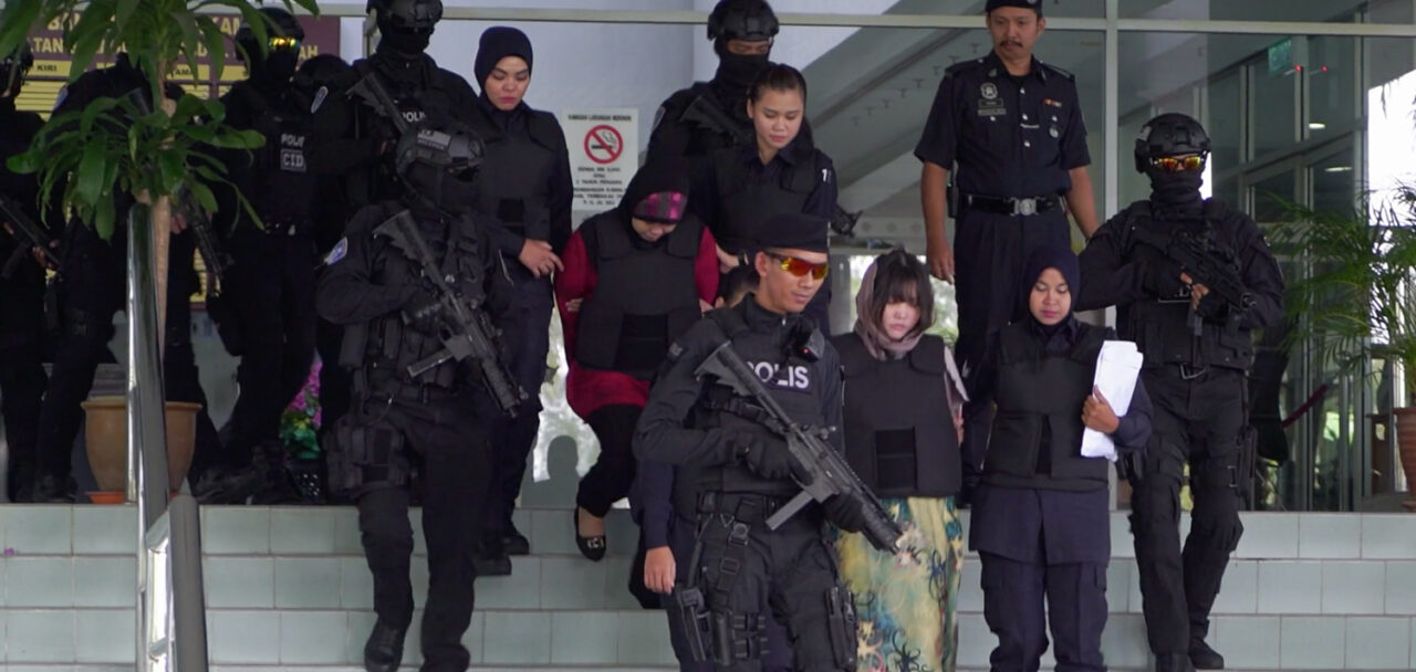 Assassins doan thi huong and siti aisyah escorted out of the courthouse by armed guards